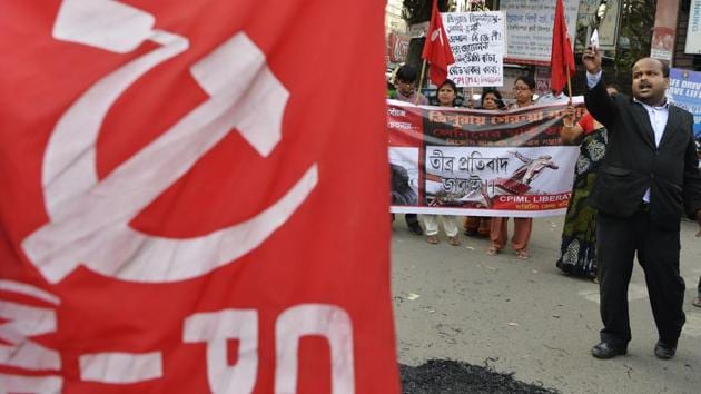 Supporters of the Communist Party of India-Marxist-Lenist (CPI-ML) chant slogans during a protest against the razing down of a statue of Vladimir Lenin in Belonia town, Tripura.(AFP File Photo)