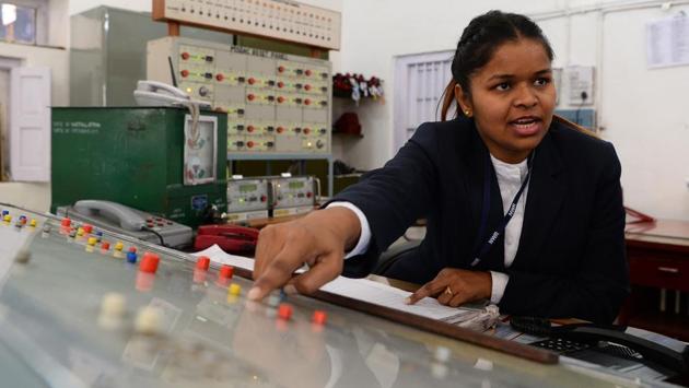 Station supervisor Neelam Jatav explains a panel used for tracking trains at Gandhinagar railway station in Jaipur. Jatav said her job had undeniably given her “new wings to fly”, but she still has to deal with men sceptical of a female authority figure. A dauntless all-woman crew is breaking new ground in Rajasthan, operating a railway station inside out, taking up roles of superintendents, conductors and station masters. (Sajjad Hussain / AFP)