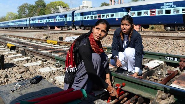 However, slow inroads are being made. At Gandhinagar, the station is equipped with sanitary napkin vending machines, a huge stride in a country where any discussion of menstruation is off limits. There is also talk of a creche, still a rarity in India, so that these women can bring their children to work. (Sajjad Hussain / AFP)