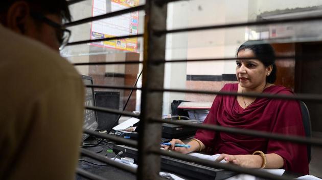 Seeing women make the trains run on time and round up troublemakers in smart government uniforms remains a leap too far for many men, suddenly forced to interact with women outside their comfort zone. Jatav and other staff members routinely experience astonished looks from men making excuses to gawk inside their booth as they try to work. (Sajjad Hussain / AFP)