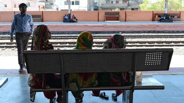 With most Indian women engaged in domestic work or childcare, social taboos disapproving of women earning their own income and village womenfolk still expected to remain indoors, an all-woman crew ‘manning’ a major junction is bound to make eyes roll. Mahima Dutt Sharma, a staff person working at the station said, “They (men) are not used to seeing women handling such jobs, so I don’t really blame them.” (Sajjad Hussain / AFP)