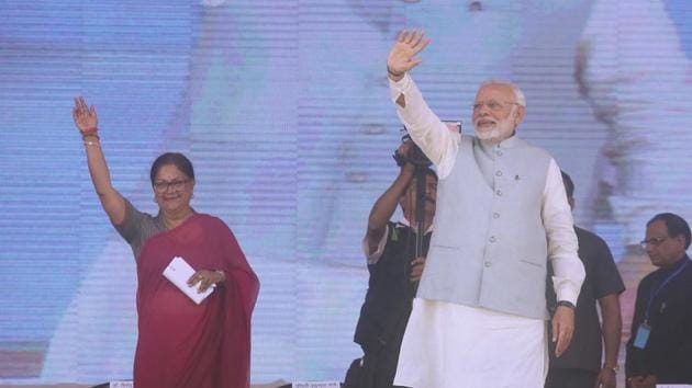 Prime Minister Narendra Modi and chief minister Vasundhara Raje at the Launch of national nutrition mission in Jhunjhunu district of Rajasthan.(Himanshu Vyas/HT Photo)