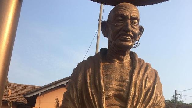 A statue of Mahatma Gandhi was vandalised by unidentified people in Thaliparambha in north Kerala’s Kannur district, police said on Thursday, latest in the series of attacks on statues of political figures in many parts of the country. The police said assailants hurled stones and bottles damaging the spectacle and garland on the statue. (HT Photo)