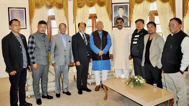 Nationalist Democratic Progressive Party leader Neiphiu Rio with BJP general secretary Ram Madhav, JD (U) elected candidate G Kaito Aye, Independent MLA Tongpang Ozukum and NDPP-BJP state officials pose with Nagaland governor PB Acharya at Raj Bhavan in Kohima. Rio on Thursday took the oath for the fourth time as the chief minister of Nagaland and assured more transparency and a “positive change” in the northeastern state. (PTI File)