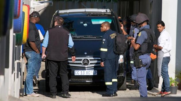 File photo of a police raid on the home of the Gupta family, friends of President Jacob Zuma, in Johannesburg, on February 14. (Reuters) File photo of a police raid on the home of the Gupta family, friends of President Jacob Zuma, in Johannesburg, on February 14. (Reuters)