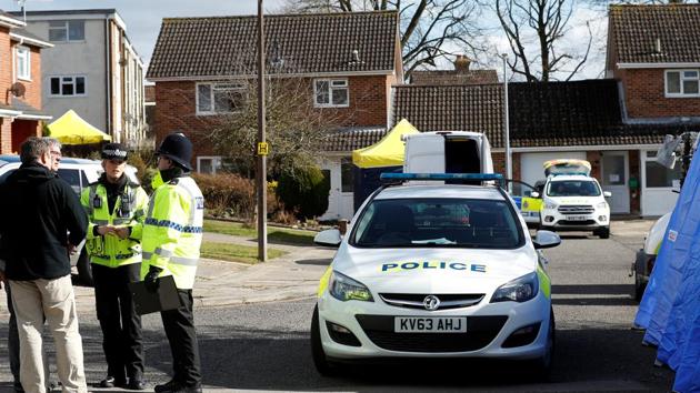 Police officers stand guard outside the home of Sergei Skripal in Salisbury, Britain, on Thursday. (Reuters Photo) Police officers stand guard outside the home of Sergei Skripal in Salisbury, Britain, on Thursday. (Reuters Photo)