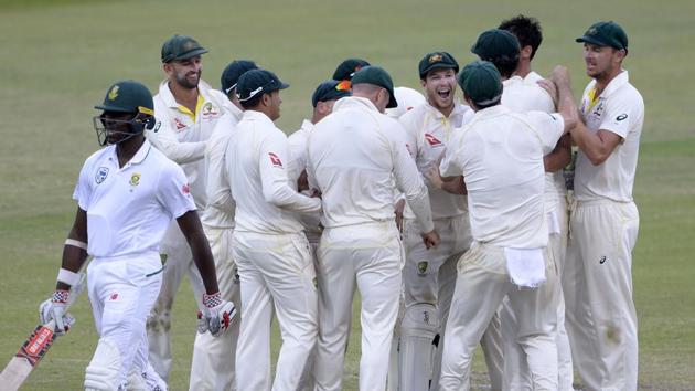 Australia cricket team players celebrate the fall of Kagiso Rabada of South Africa cricket team during Day 4 of the first Test in Durban on March 4. The Aussies beat SA in the ill-tempered Test match to take 1-0 lead in the series (Getty Images) Australia cricket team players celebrate the fall of Kagiso Rabada of South Africa cricket team during Day 4 of the first Test in Durban on March 4. The Aussies beat SA in the ill-tempered Test match to take 1-0 lead in the series (Getty Images)