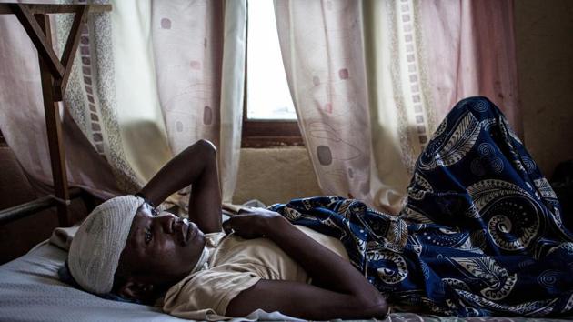 Myime - Richards, 32, recovers after losing his wife, three of his four children and suffering lacerations to his head and neck after an attack on his village. UNICEF on February 23 said it had identified 70 unaccompanied children and 245 children who had been separated from their parents and who “need urgent help” at the hospital site. (John Wessels / AFP) Myime - Richards, 32, recovers after losing his wife, three of his four children and suffering lacerations to his head and neck after an attack on his village. UNICEF on February 23 said it had identified 70 unaccompanied children and 245 children who had been separated from their parents and who “need urgent help” at the hospital site. (John Wessels / AFP)