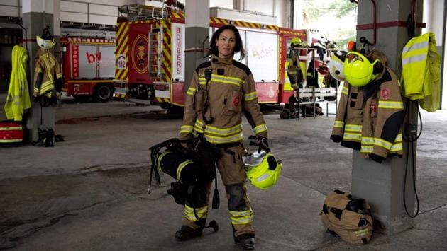 Maria Jose Martienz Ortiz, 43, Spanish firefighter poses for a picture in the 'Fuente San Luis' fire station facilities in Valencia. (Jose Jordan / AFP) 