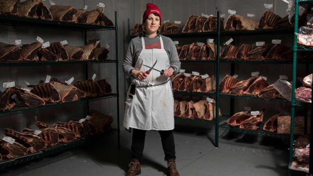 Heather Marold Thomason, butcher and founder of Primal Supply Meats, poses for a picture in her company's dry-aging room, in Lansdowne, Pennsylvania. (Dominick Reuter / AFP) 