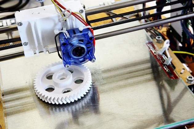 3D printer creating white plastic gear. The international science community is increasingly engaging with both the science and technology industry and government leaders.(Getty Images/iStockphoto)