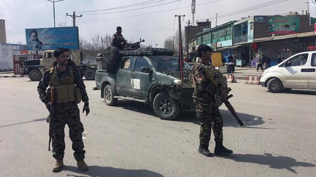 Afghan security forces keep watch near the site of an explosion in Kabul on March 9, 2018.(AFP File) Afghan security forces keep watch near the site of an explosion in Kabul on March 9, 2018.(AFP File)