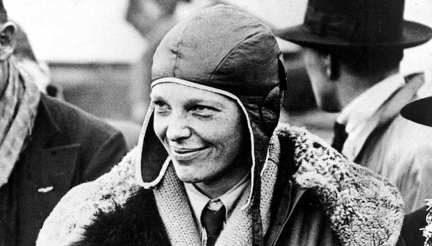 In a June 26, 1928 file photo, American aviatrix Amelia Earhart poses with flowers as she arrives in Southampton, England, after her transatlantic flight on the "Friendship" from Burry Point, Wales. (AP) In a June 26, 1928 file photo, American aviatrix Amelia Earhart poses with flowers as she arrives in Southampton, England, after her transatlantic flight on the "Friendship" from Burry Point, Wales. (AP)
