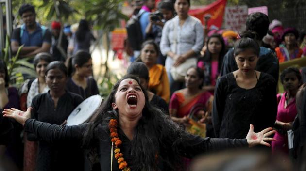 A girl performs in a street play highlighting domestic violence before the start of a march on International Women's Day in New Delhi on March 8, 2018. (Manish Swarup / AP) A girl performs in a street play highlighting domestic violence before the start of a march on International Women's Day in New Delhi on March 8, 2018. (Manish Swarup / AP)