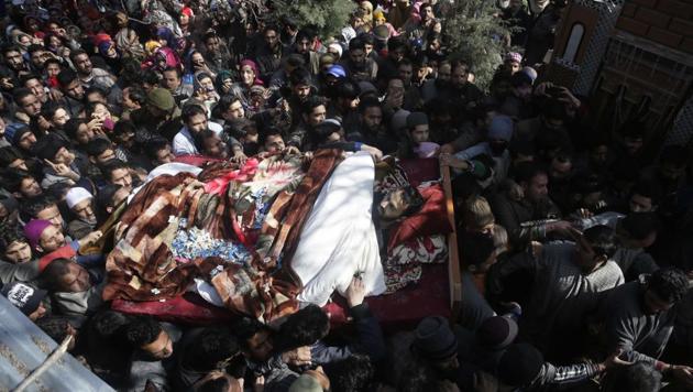 Villagers shout slogans as they carry the body of a civilian Suhail Ahmad during his funeral at Pinjura village, Srinagar on March 5, 2018. Over a dozen protests erupted across Kashmir on Monday, as tens of thousands of protesters poured into the streets after soldiers killed four civilians and two suspected militants. (Mukhtar Khan / AP) Villagers shout slogans as they carry the body of a civilian Suhail Ahmad during his funeral at Pinjura village, Srinagar on March 5, 2018. Over a dozen protests erupted across Kashmir on Monday, as tens of thousands of protesters poured into the streets after soldiers killed four civilians and two suspected militants. (Mukhtar Khan / AP)