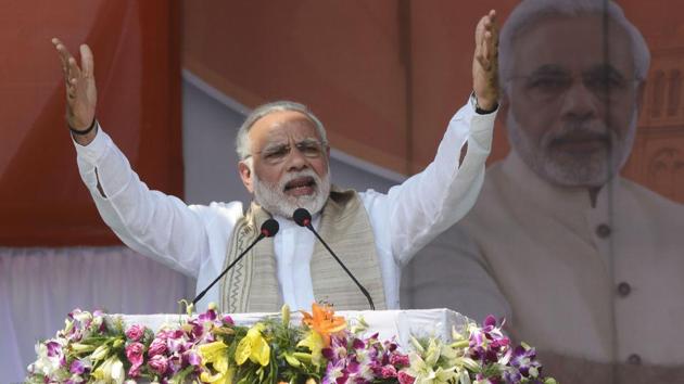 Prime Minister Narendra Modi gestures during the swearing-in ceremony of Tripura legislative assembly at Assam Rifles ground in Agartala on March 9. (AFP Photo) Prime Minister Narendra Modi gestures during the swearing-in ceremony of Tripura legislative assembly at Assam Rifles ground in Agartala on March 9. (AFP Photo)