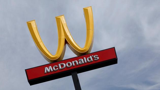 McDonald's iconic 'M' logo is turned upside down in honour of International Women's Day in Lynwood, California. (Mike Blake / REUTERS) McDonald's iconic 'M' logo is turned upside down in honour of International Women's Day in Lynwood, California. (Mike Blake / REUTERS)