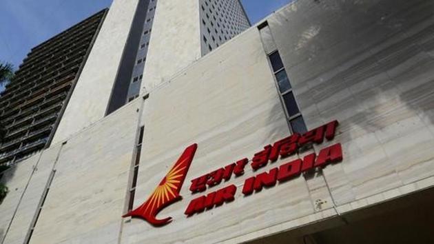 The Air India logo is seen on the facade of its office building in Mumbai. The government will invite initial bids for Air India in the next couple of weeks. (Reuters File) The Air India logo is seen on the facade of its office building in Mumbai. The government will invite initial bids for Air India in the next couple of weeks. (Reuters File)