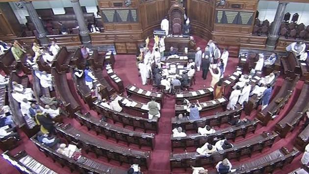 Opposition members protest during the second phase of the budget session of Parliament in the Rajya Sabha, in New Delhi on Friday. (PTI Photo) Opposition members protest during the second phase of the budget session of Parliament in the Rajya Sabha, in New Delhi on Friday. (PTI Photo)