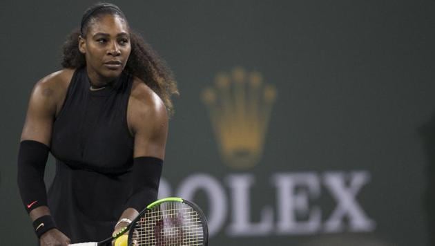 Serena Williams of the United States prepares to serve to Kazakh Zarina Diyas during the first round of the BNP Paribas Open tennis tournament in Indian Wells on Thursday.(AP)