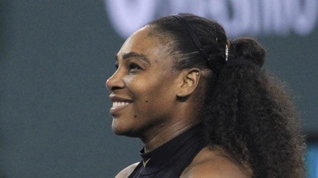 Serena Williams of the United States smiles after defeating Zarina Diyas of Kazakhstan, 7-5, 6-3, during the first round of the BNP Paribas Open tennis tournament in Indian Wells, California, Thursday.(AP)