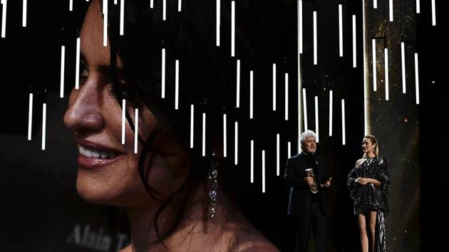 Spanish filmmaker Pedro Almodovar (C) speaks on stage flanked by French actress Marion Cotillard (R) prior to handing the Honour award to Spanish actress Penelope Cruz (L) during the 43rd edition of the Cesar Awards ceremony at the Salle Pleyel in Paris. (Philippe Lopez / AFP) Spanish filmmaker Pedro Almodovar (C) speaks on stage flanked by French actress Marion Cotillard (R) prior to handing the Honour award to Spanish actress Penelope Cruz (L) during the 43rd edition of the Cesar Awards ceremony at the Salle Pleyel in Paris. (Philippe Lopez / AFP)
