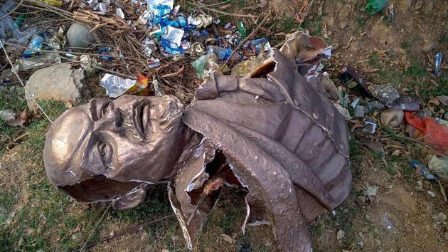 Remains of the five-feet tall statue of Lenin vandalised in Tripura earlier this week.(HT file)