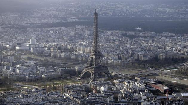 (FILES) - An aerial file photo taken on January 11, 2015 shows the Eiffel Tower in Paris. The Eiffel Tower was closed to the public in the morning on September 20, 2015 following an intrusion attempt. AFP PHOTO / KENZO TRIBOUILLARD(AFP File) (FILES) - An aerial file photo taken on January 11, 2015 shows the Eiffel Tower in Paris. The Eiffel Tower was closed to the public in the morning on September 20, 2015 following an intrusion attempt. AFP PHOTO / KENZO TRIBOUILLARD(AFP File)