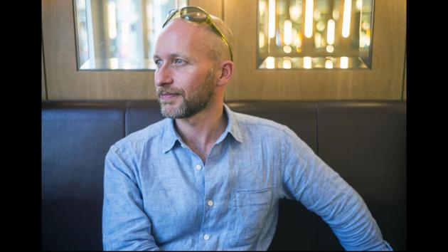 A portrait of Stuart Freedman, the author of ‘The Palaces of Memory.’ Even though many coffee houses, like the one in Delhi, face regular threats of closure, Freedman is unbothered. “If this one shuts, the space will mushroom somewhere else,” he says. (Courtesy Tasveer)