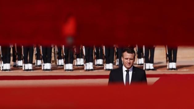 Emmanuel Macron inspects an honour guard during his ceremonial reception in New Delhi. On Saturday, Macron will take part in a Town Hall and have an interactive session, in which nearly 300 students from different institutions are expected to participate. Later in the day, he will take part in a Knowledge Summit which will be attended by more than 200 academicians from both sides. (Adnan Abidi / REUTERS) 