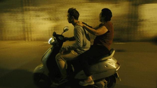 Two people on a scooter in Tangra by night. In the late 18th century, Kolkata was the terminus, the port and the transit point to pretty much everywhere . Among the Chinese who came to Kolkata, the Cantonese were ship-fitters; by the ’50s they had moved into carpentry. The Hakkas were shoe-smiths and leather manufacturers. All of them came to India to work, and not to cook. (Samir Jana / HT PHOTO)