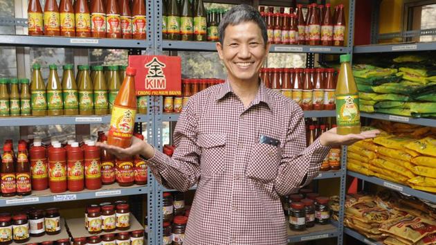 Dominic Lee, a Hakka, who owns Pou Chong, one of the most well-known brands of sauce and noodles made by the community near Tiretta Bazaar, is perceived as Mr Lee, the sauce-maker, not the Indian-Chinese sauce-maker. His professional identity, he says, has never felt eclipsed by his racial identity. (Samir Jana / HT PHOTO)