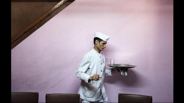 Indian Coffee House, Chandigarh, India, 2013. During their rule in India, the British set up the Indian Coffee Expansion Board in 1942. The idea was to have English coffee and snacks available to the servicemen posted in India. (© Stuart Freedman / Tasveer)