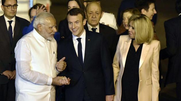 Macron arrived in the national capital on Friday night and was received at Air Force Station Palam by Prime Minister Narendra Modi, in a special gesture. He was accompanied by his wife Brigitte Marie-Claude Macron, besides senior ministers from his Cabinet. (Vipin Kumar / HT Photo) 
