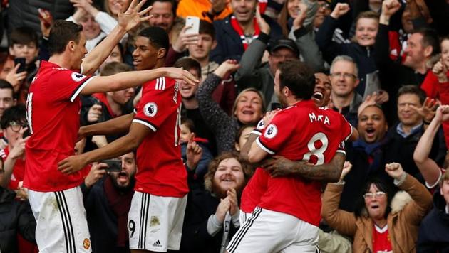 Manchester United's Marcus Rashford celebrates scoring their second goal in a Premier League fixture against Liverpool at Old Trafford in Manchester on Saturday.(Reuters)