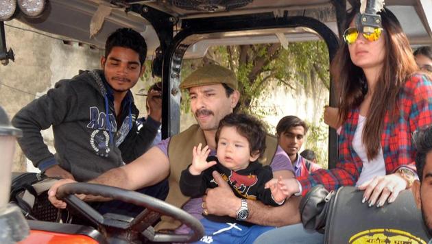 Saif Ali Khan, Kareena Kapoor Khan and their son Taimur Ali Khan ride a tractor at Pataudi Palace in Gurugram. (PTI) Saif Ali Khan, Kareena Kapoor Khan and their son Taimur Ali Khan ride a tractor at Pataudi Palace in Gurugram. (PTI)