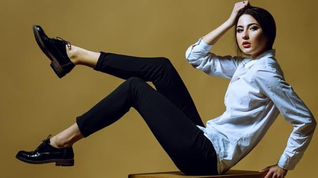 Chunky turtlenecks over embellished light-wash boyfriend jeans go well with glitter mules. A funky outfit can look sassier with hot coloured-trims slip-ons or oxfords. (Shutterstock) Chunky turtlenecks over embellished light-wash boyfriend jeans go well with glitter mules. A funky outfit can look sassier with hot coloured-trims slip-ons or oxfords. (Shutterstock)