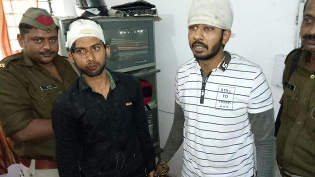 Police arrested Minhaz (left) and Saif (right) for allegedly attempting to rob a senior citizen in Noida using fake pistols. Police are hunting for their two other accomplices. Police arrested Minhaz (left) and Saif (right) for allegedly attempting to rob a senior citizen in Noida using fake pistols. Police are hunting for their two other accomplices.