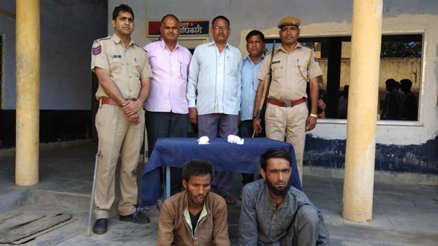 The two men arrested on charge of smuggling cows at Kaman police station in Bharatpur. (HT PHOTO) The two men arrested on charge of smuggling cows at Kaman police station in Bharatpur. (HT PHOTO)