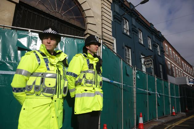 Police officers stand in front of a cordon in front the Zizzi restaurant in Salisbury on March 11, 2018. (AFP) Police officers stand in front of a cordon in front the Zizzi restaurant in Salisbury on March 11, 2018. (AFP)