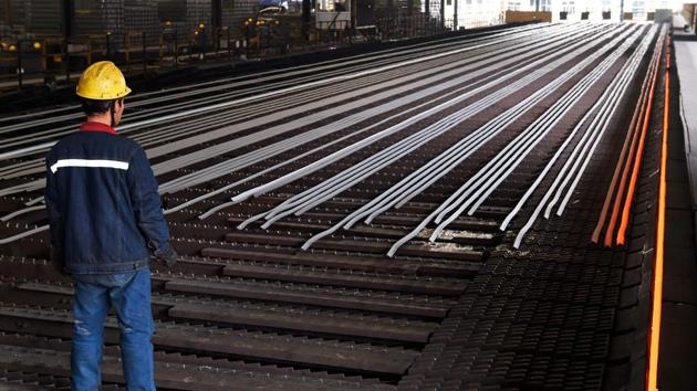 A worker stands in a steel workshop in Zouping, in China's eastern Shandong province on March 10. (AFP Photo) A worker stands in a steel workshop in Zouping, in China's eastern Shandong province on March 10. (AFP Photo)