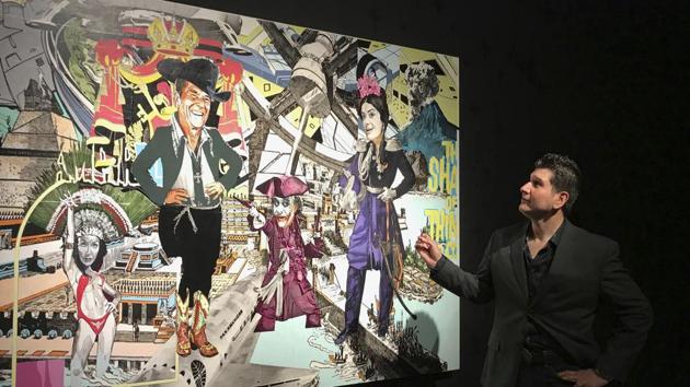 Artist Claudio Dicochea explains one of the paintings in his Acid Baroque exhibit on display at the Scottsdale Museum of Contemporary Art in Scottsdale, Arizona. (AP) Artist Claudio Dicochea explains one of the paintings in his Acid Baroque exhibit on display at the Scottsdale Museum of Contemporary Art in Scottsdale, Arizona. (AP)