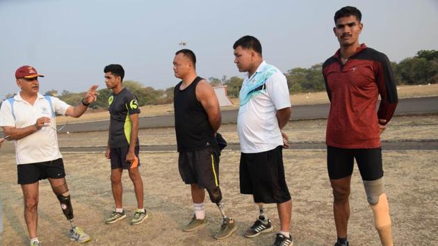 A group of the para-athletes at the Paralympic Sports Node, BEG, share a light moment during training. A total of 26 athletes are training under Lt Col Gaurav Dutta.(HT PHOTO)