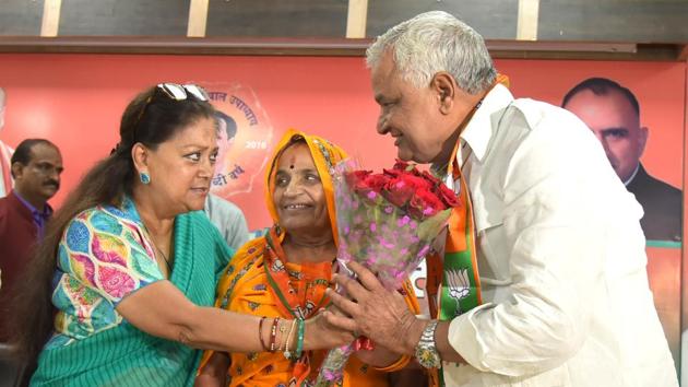 Chief minister Vasundhara Raje welcomes NPP MLA Kirori Lal Meena into BJP. (Prabhakar Sharma/ HT Photo) Chief minister Vasundhara Raje welcomes NPP MLA Kirori Lal Meena into BJP. (Prabhakar Sharma/ HT Photo)