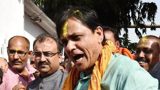 BJP state president Nityanand Rai beats a 'dhol'  while celebrating the party’s win in North-East states assembly elections at BJP state headquarters in Patna. (PTI File Photo)