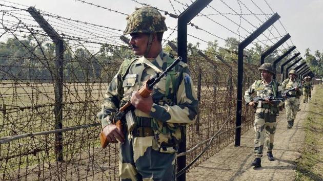 Border Security Force personnel patrol along the India-Bangladesh border fence at Yakub Nagar village ahead in Dharmanagar, Tripura. (PTI File Photo) Border Security Force personnel patrol along the India-Bangladesh border fence at Yakub Nagar village ahead in Dharmanagar, Tripura. (PTI File Photo)