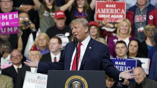 US President Donald Trump speaks in support of Republican congressional candidate Rick Sacconne during a rally in Moon Township, Pennsylvania.(REUTERS)