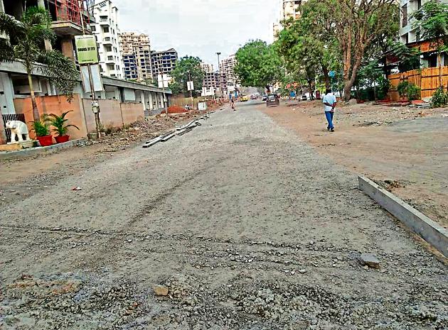 The construction work of the approach road between Shankarrao Madhukar Dhule Patil road chowk and Ganga Florentina in Monhammadwadi finally began on February 11, but is moving at a snail’s pace, according to the area residents. (HT PHOTO) The construction work of the approach road between Shankarrao Madhukar Dhule Patil road chowk and Ganga Florentina in Monhammadwadi finally began on February 11, but is moving at a snail’s pace, according to the area residents. (HT PHOTO)