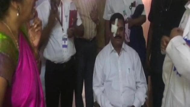 Telangana legislative council chairman K Swamy Goud suffered injuries on his right eye on Monday when a protesting Congress MLA, K V Reddy, threw a headphone at the speaker’s podium during governor E S L Narasimhan’s address to the joint session of the state legislature. (ANI/Twitter) Telangana legislative council chairman K Swamy Goud suffered injuries on his right eye on Monday when a protesting Congress MLA, K V Reddy, threw a headphone at the speaker’s podium during governor E S L Narasimhan’s address to the joint session of the state legislature. (ANI/Twitter)