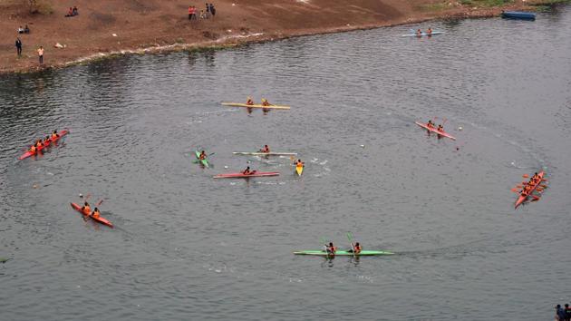 Students of COEP display Kayak Ballet during the 90th Regatta at Boat Club in Pune. (Pratham Gokhale/HT Photo)